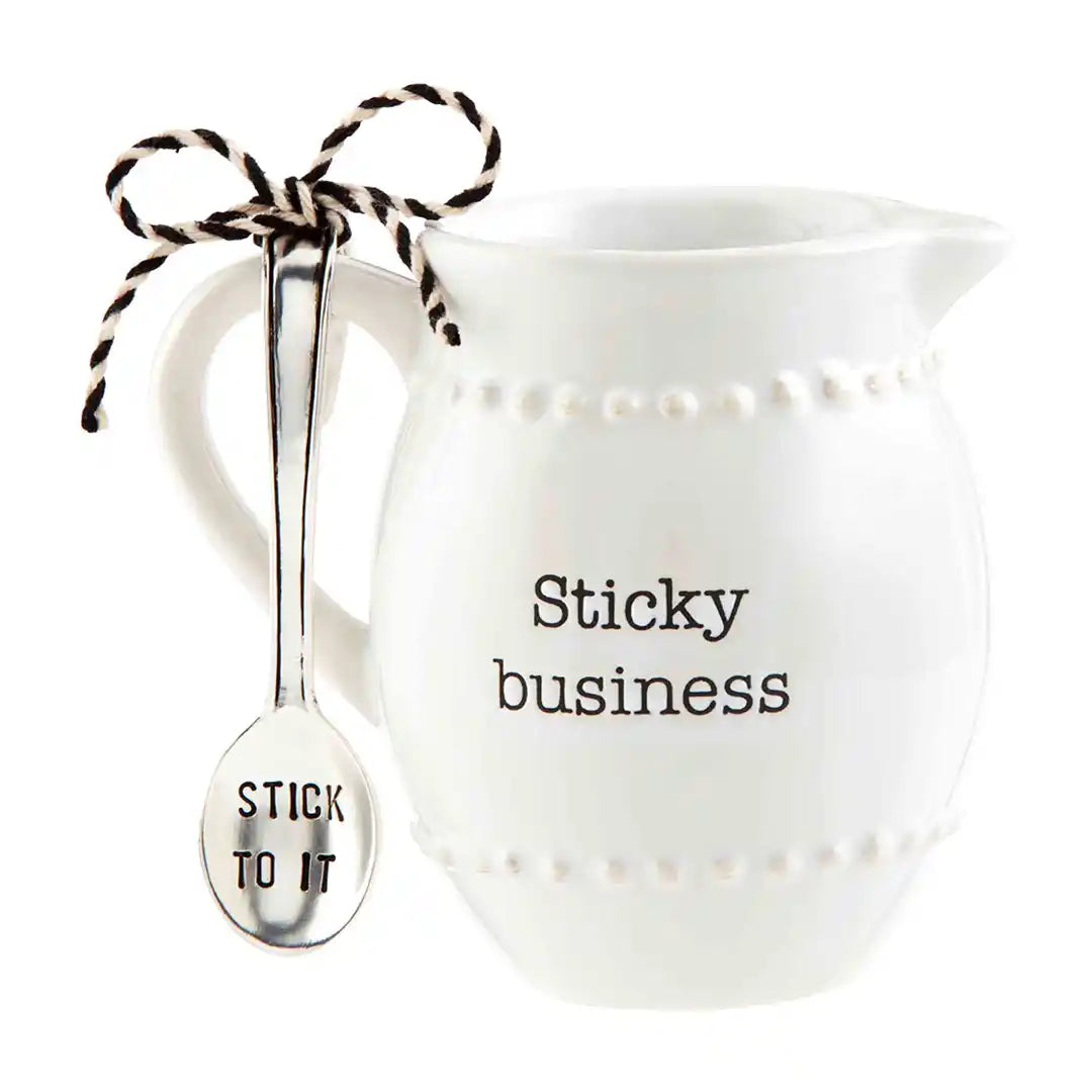 Syrup Pitcher and Spoon